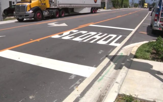 Road crew misspells ‘school’ in school crossing