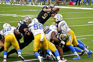 Lutz lifts Saints past hard-luck Chargers, 30-27 in OT