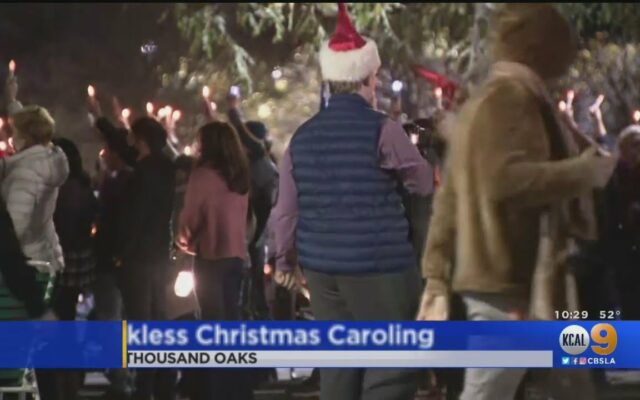 Mostly maskless carolers protest L.A. County stay-at-home order