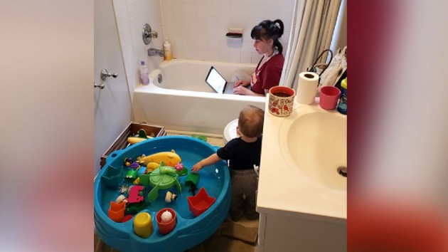 Photo of mom working in bathtub leads to reflection on child care crisis