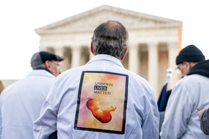 Justices signal they may toss Roe, allow new abortion limits