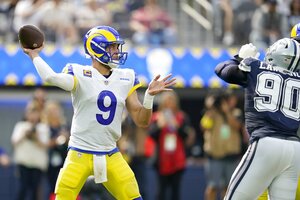 Dominant D puts Cowboys past Rams 22-10 for 4th straight win